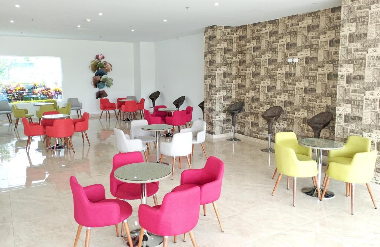Hotel Royal Elim International Cali Exteriér fotografie Interior of the new library