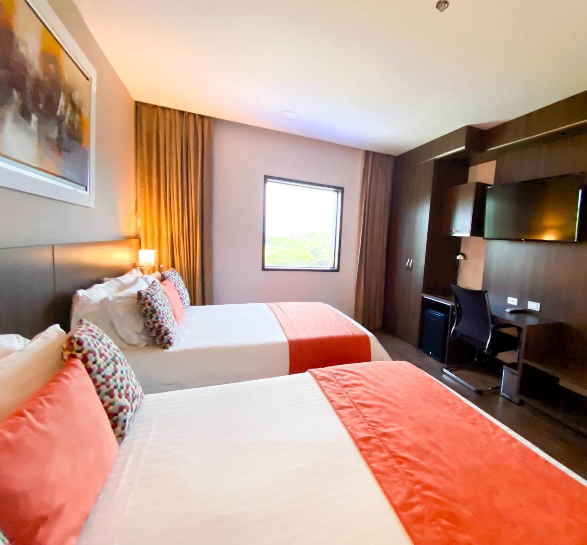 Hotel Royal Elim International Cali Exteriér fotografie A room at the hotel
