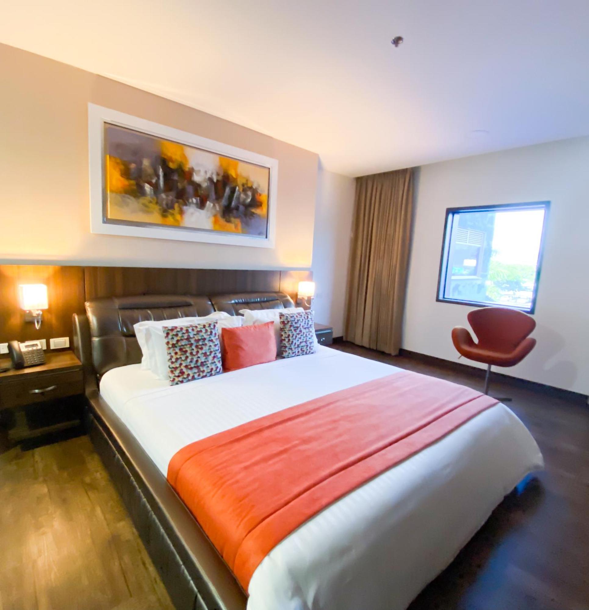 Hotel Royal Elim International Cali Exteriér fotografie A bedroom at the hotel