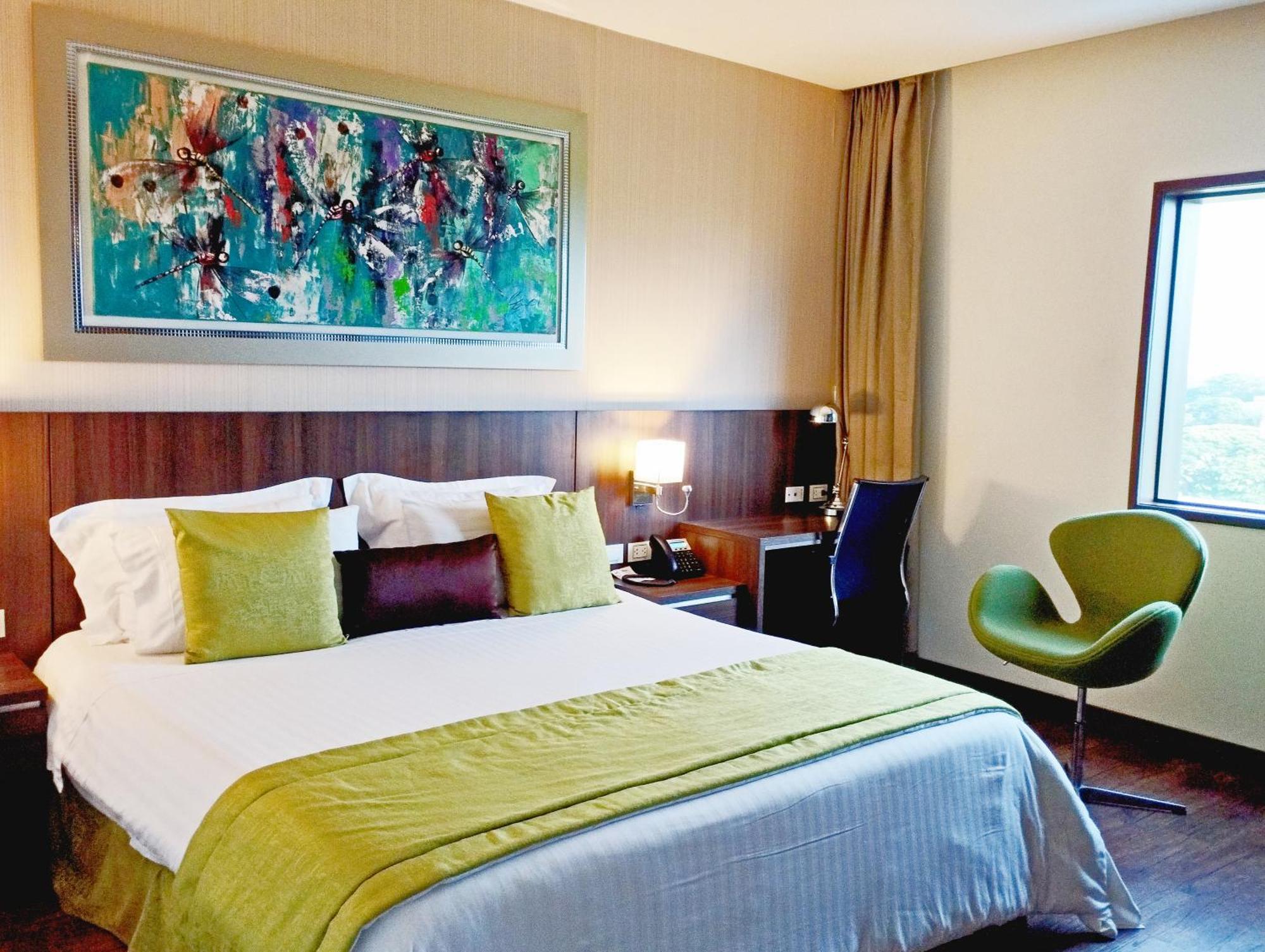 Hotel Royal Elim International Cali Exteriér fotografie A room at the hotel