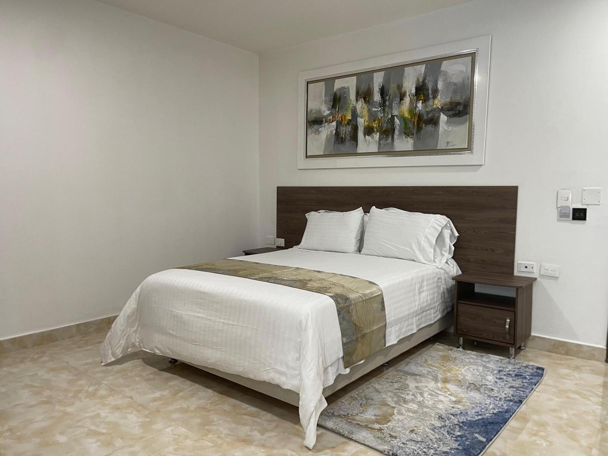 Hotel Royal Elim International Cali Exteriér fotografie A bedroom in the hotel